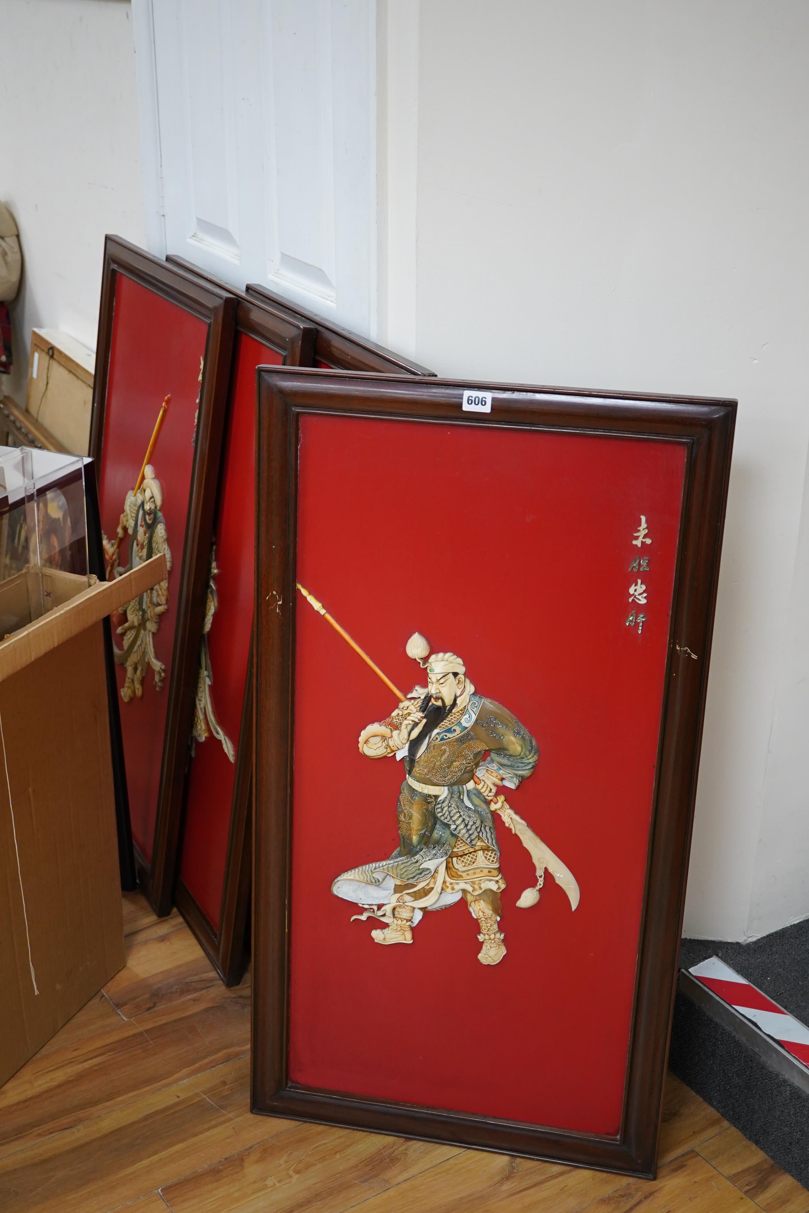 Four large Chinese lacquer and bone mounted relief panels depicting warriors, each 99cm high. Condition - fair to good